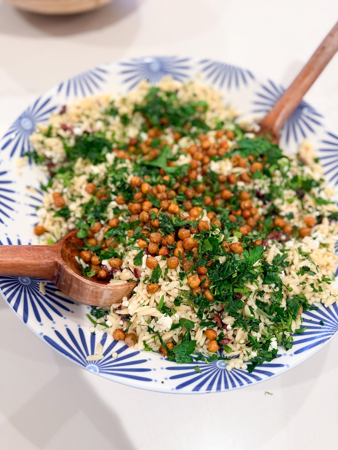 greek orzo pasta salad with fresh herbs and crispy chickpeas